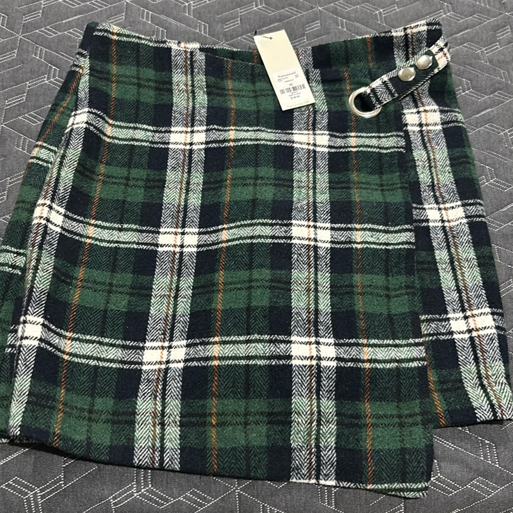 Francesca’s plaid green and blue skirt! Does not have shorts underneath.